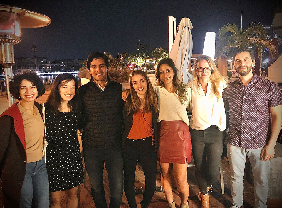 a group of fellows out on a restaurant patio