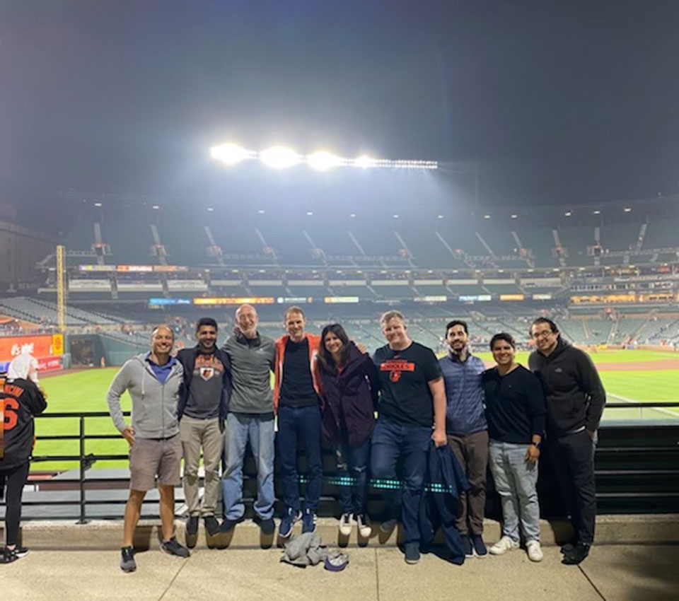 a group of fellows at an Orioles game