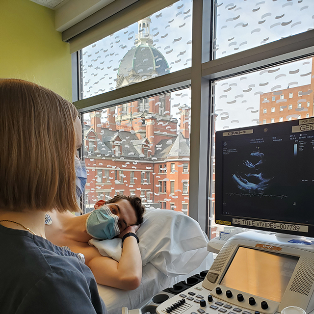 cardiac sonography training program - student performing ultrasound on patient