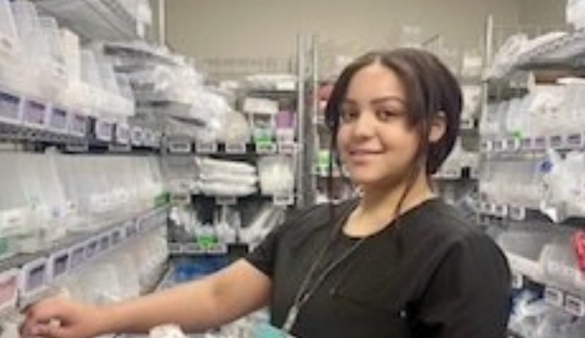 Zenibel smiling in scrubs
