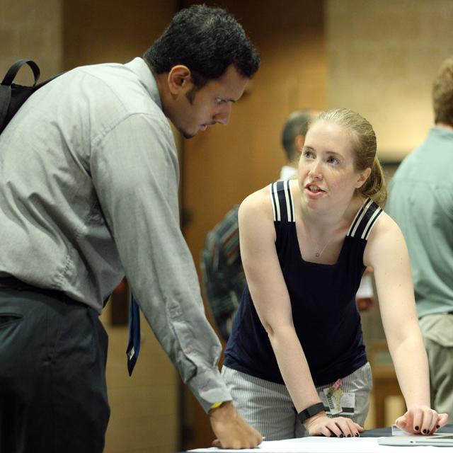 Risa Burr discusses the Biomedical careers Initiative with Mohit Mathew at a career-planning event in Turner Concourse.