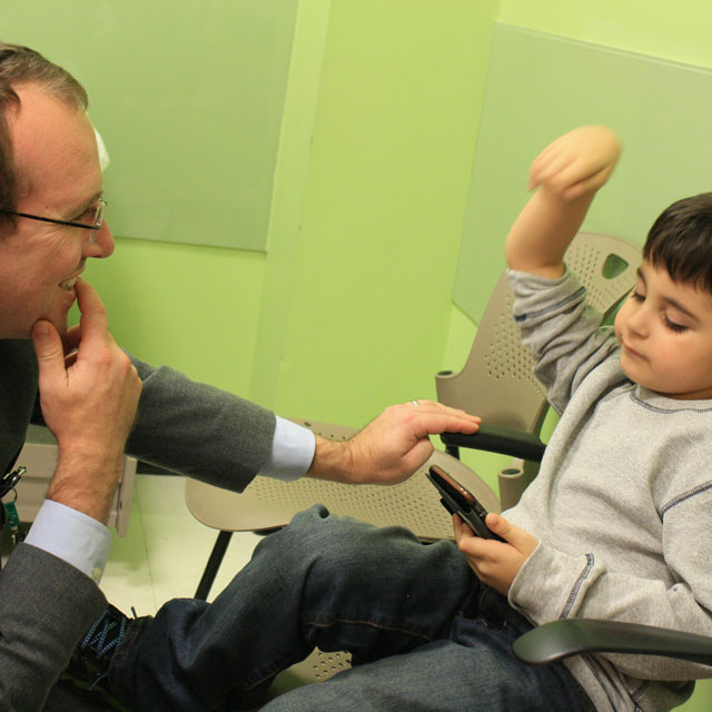 pediatric surgeon Eric Jelin works with six year old patient Julian Colon 