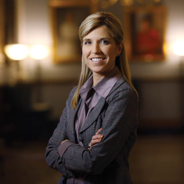 A photo shows Redonda Miller. 
