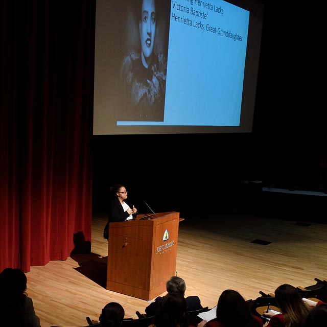 A photo shows Victoria Baptiste.