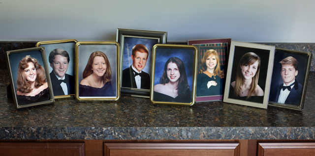 Framed photos of each of John Ryan's eight children