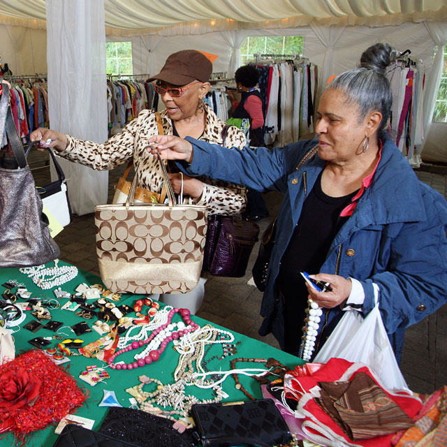A photo shows people at the Best Dressed Sale. 