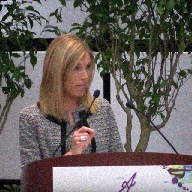 A photo shows Redonda Miller at A Woman's Journey. 