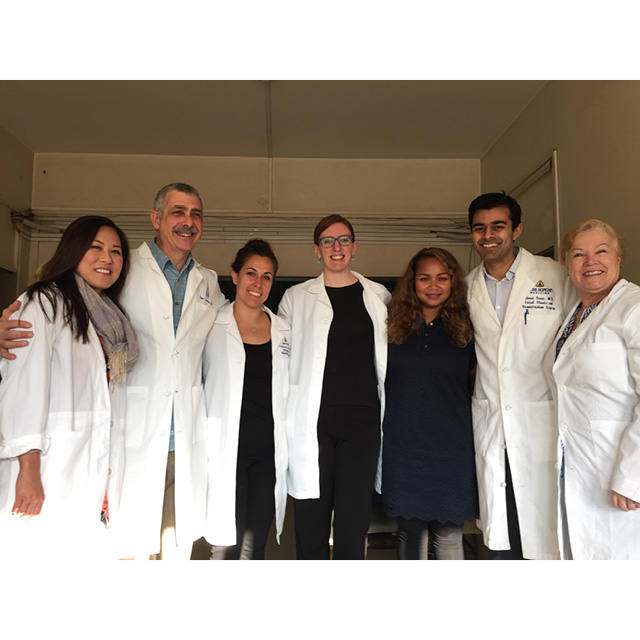 A photo shows a group of people on a mission to help children with cleft lip and palate. 