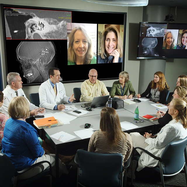 Team members of the Johns Hopkins Listening Center gather to help ensure the best possible outcomes for their patients.