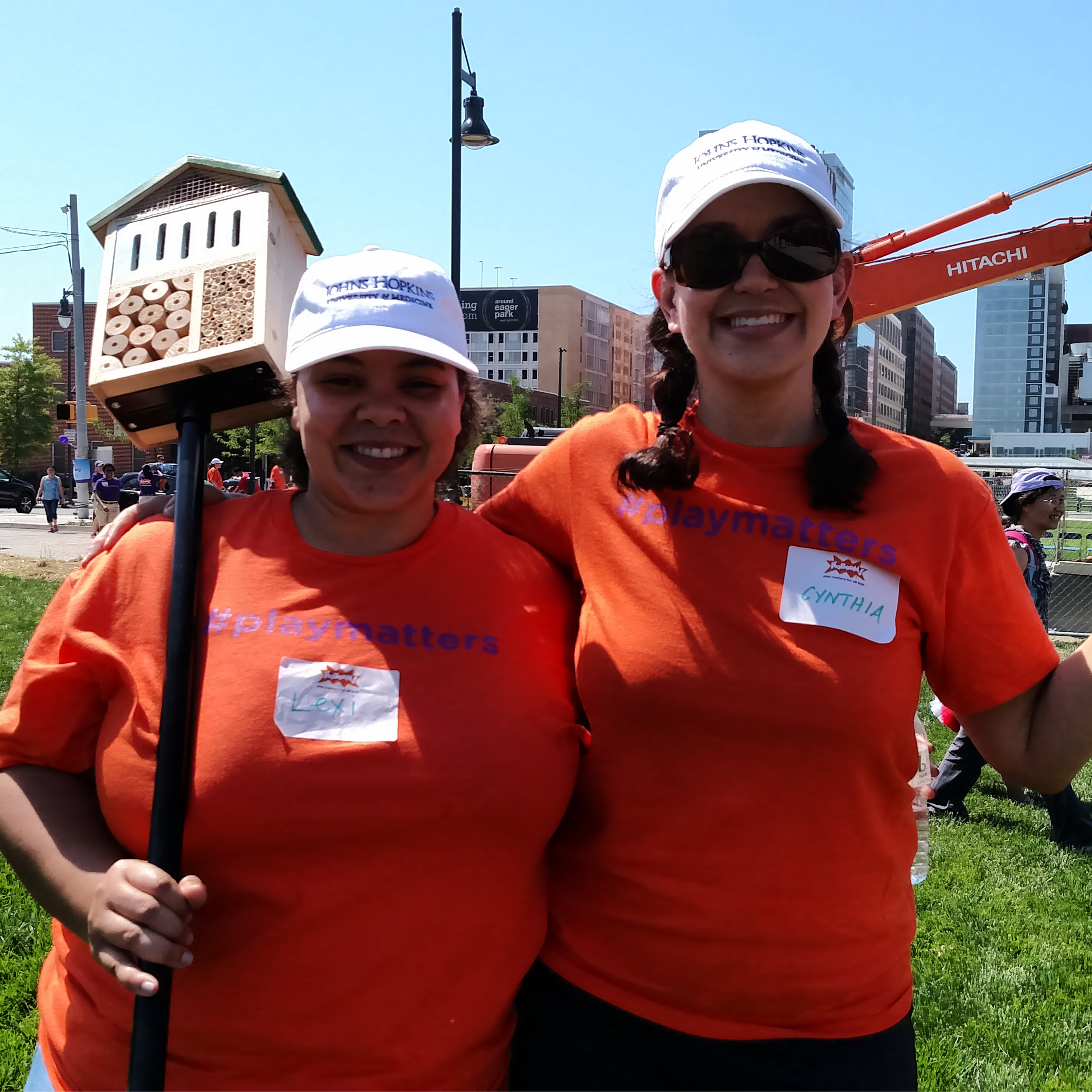 Alexia Camm and Cynthia Gutierrez-White of the Johns Hopkins Medicine Office of Marketing and Communication are all smiles on volunteer day. 
