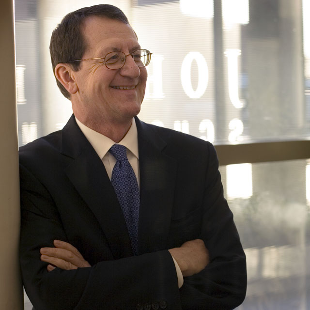 A photo shows Ron Peterson. 