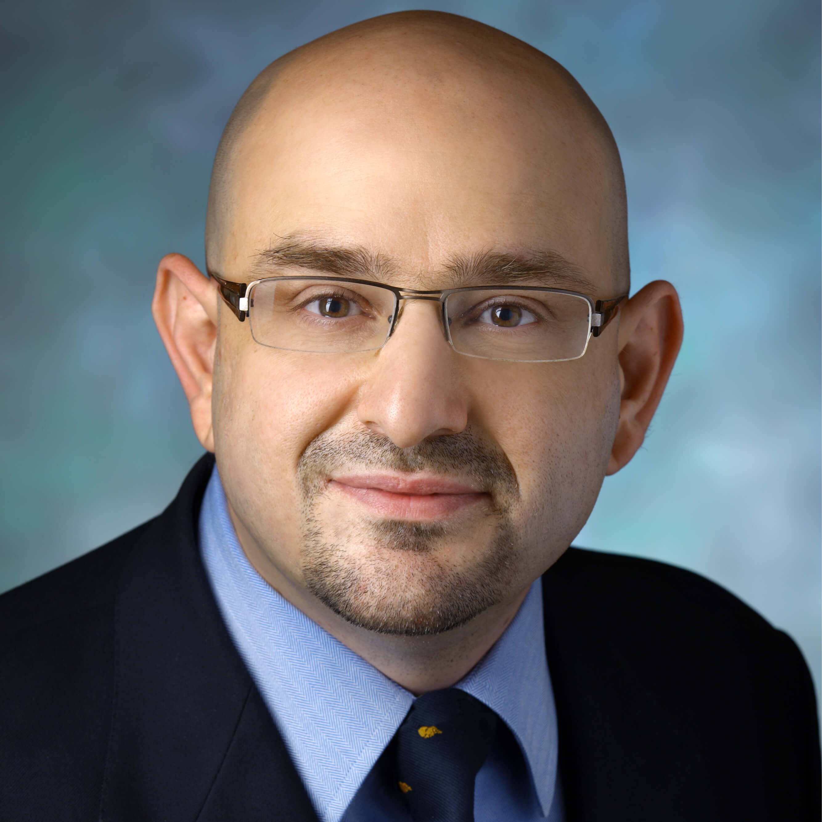 A photo shows Bashar Safar.