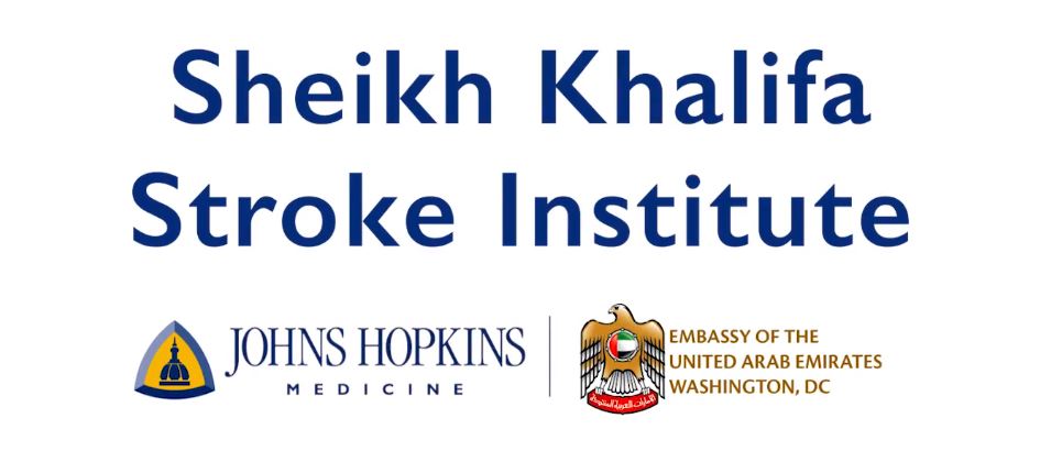 Text banner that says Sheikh Khalifa Stroke Institute. Beneath main text to the left is the Johns HOkins Medicine logo crest. Beneath main text to right is the logo for the Embassy of the United Arab Emirates, Wasington, D.C>