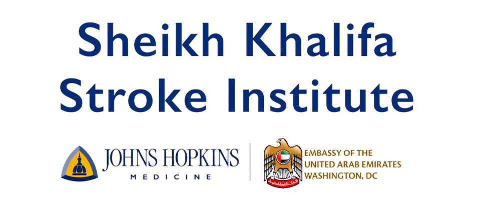 Text banner that says Sheikh Khalifa Stroke Institute. Beneath main text to the left is the Johns HOkins Medicine logo crest. Beneath main text to right is the logo for the Embassy of the United Arab Emirates, Wasington, D.C>