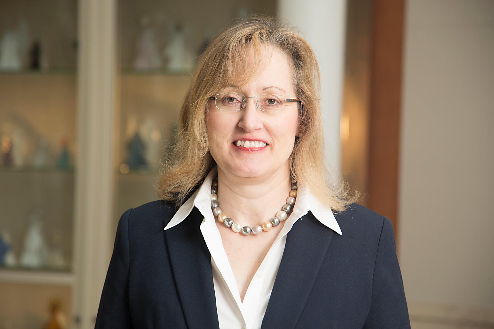 A photo shows Julie Brahmer.