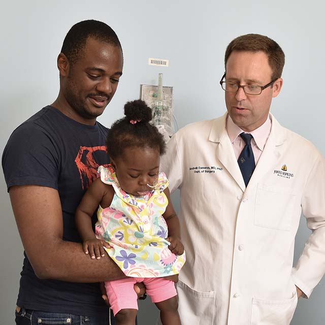 Jide, Tofunmi and Dr. Andrew Cameron