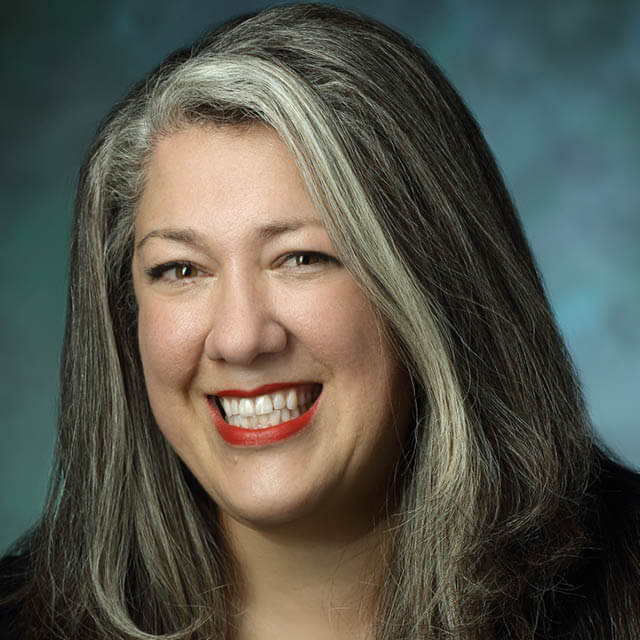 A photo shows Rebecca Canino.