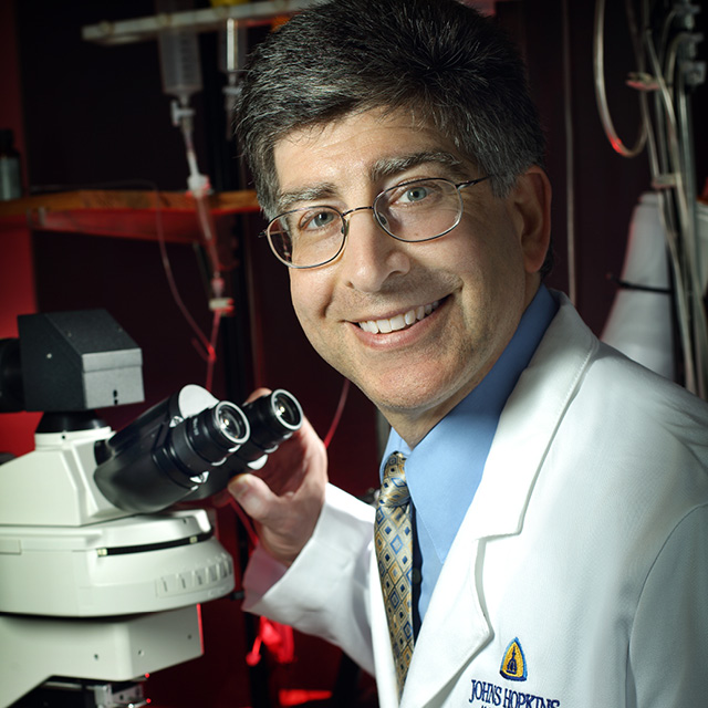 A photo shows Michael Caterina.