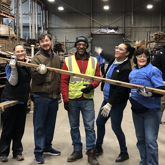 A photo shows volunteers at the 2019 MLK Day of Service at Johns Hopkins.