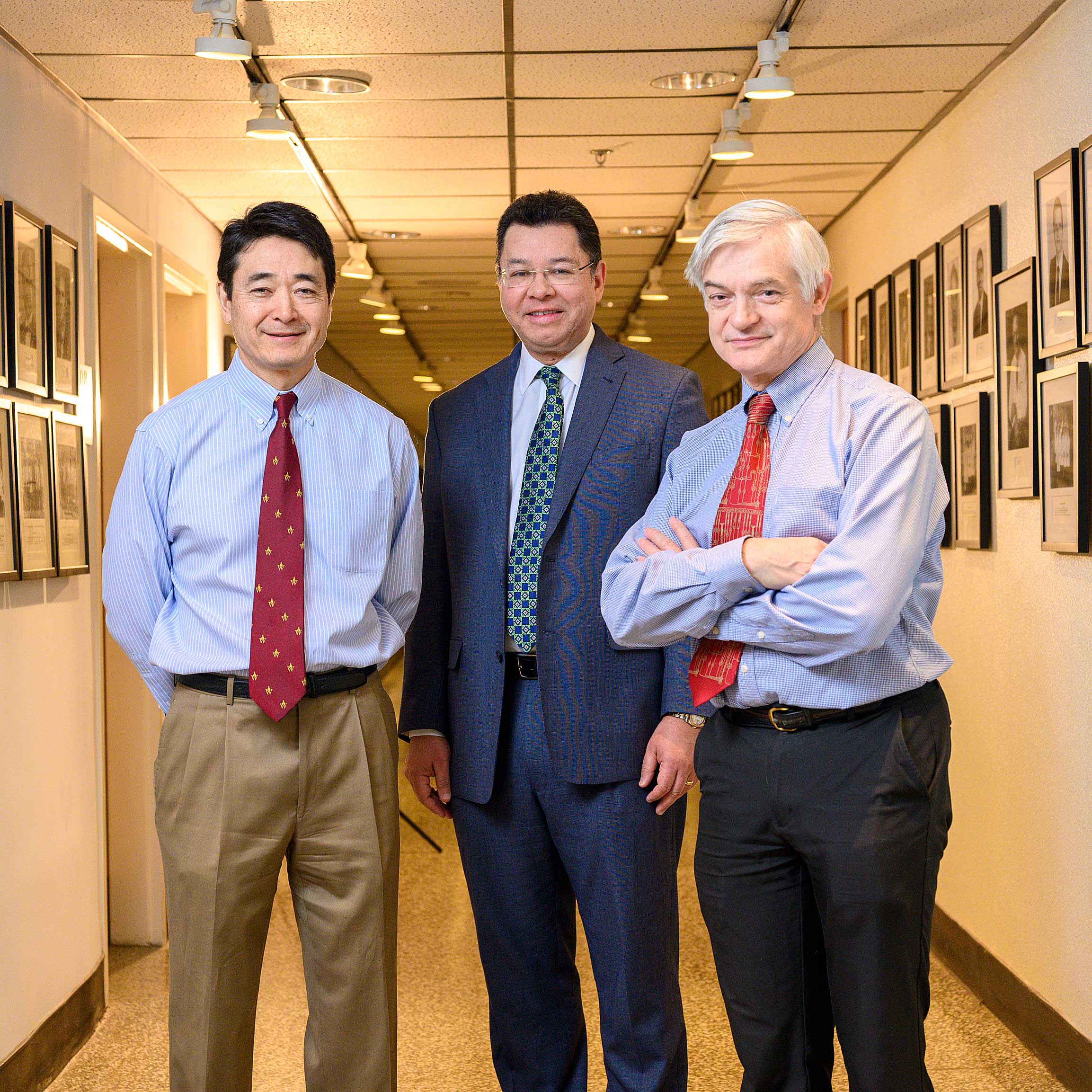 James Handa, J Fernando Arevalo and Gislin Dagnelie stand inside the Wilmer Eye Institute