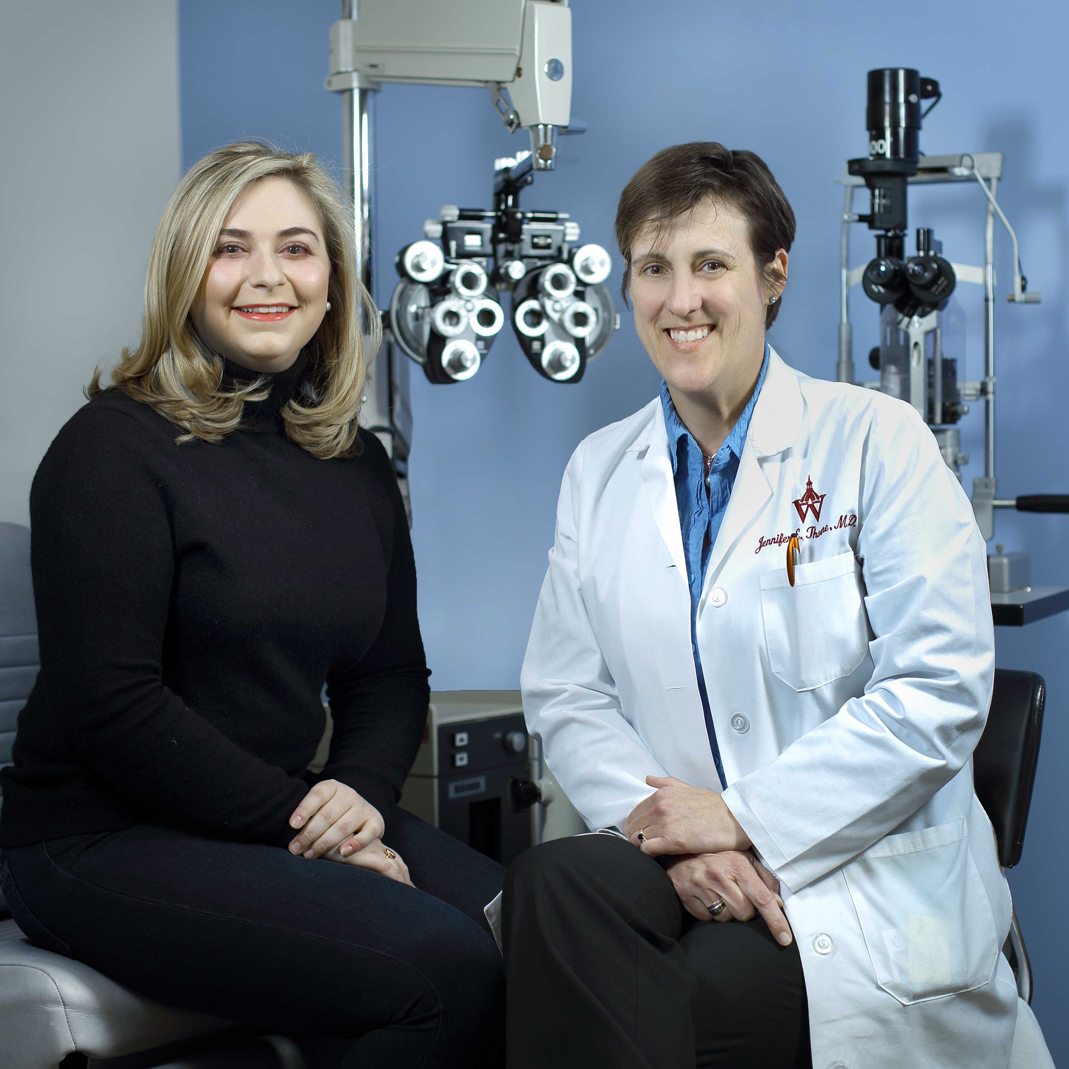 Sarah Hill and Dr. Jennifer Thorne in the ophthalmology office