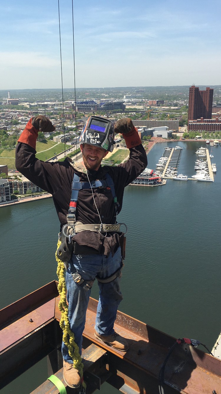Ironworker Sean Early during construction of a new building in Baltimore.