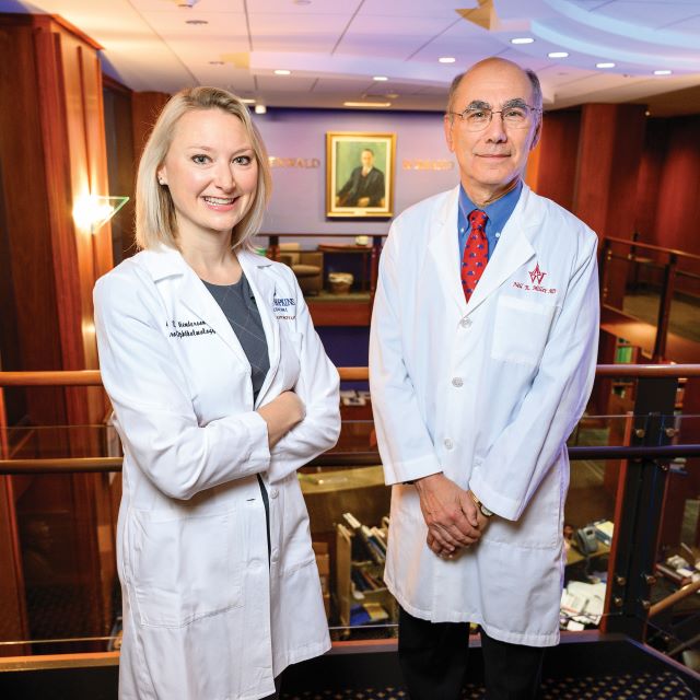 Amanda Henderson with her mentor in neuro- ophthalmology, Neil Miller.