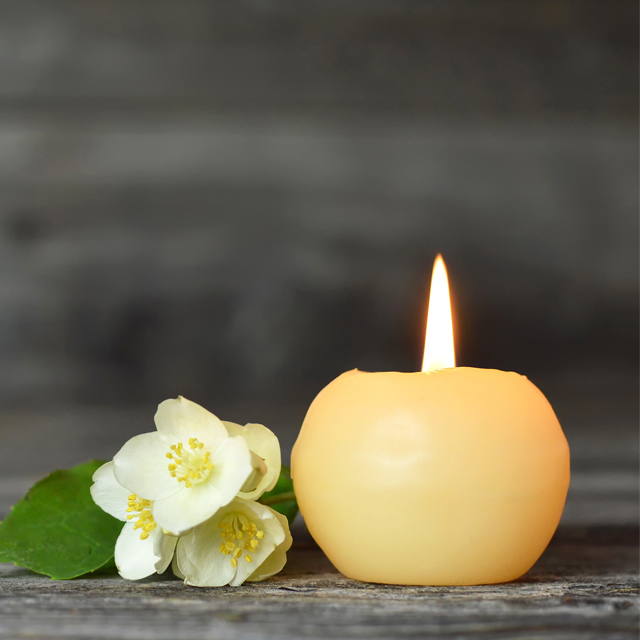 candle and flower memorium