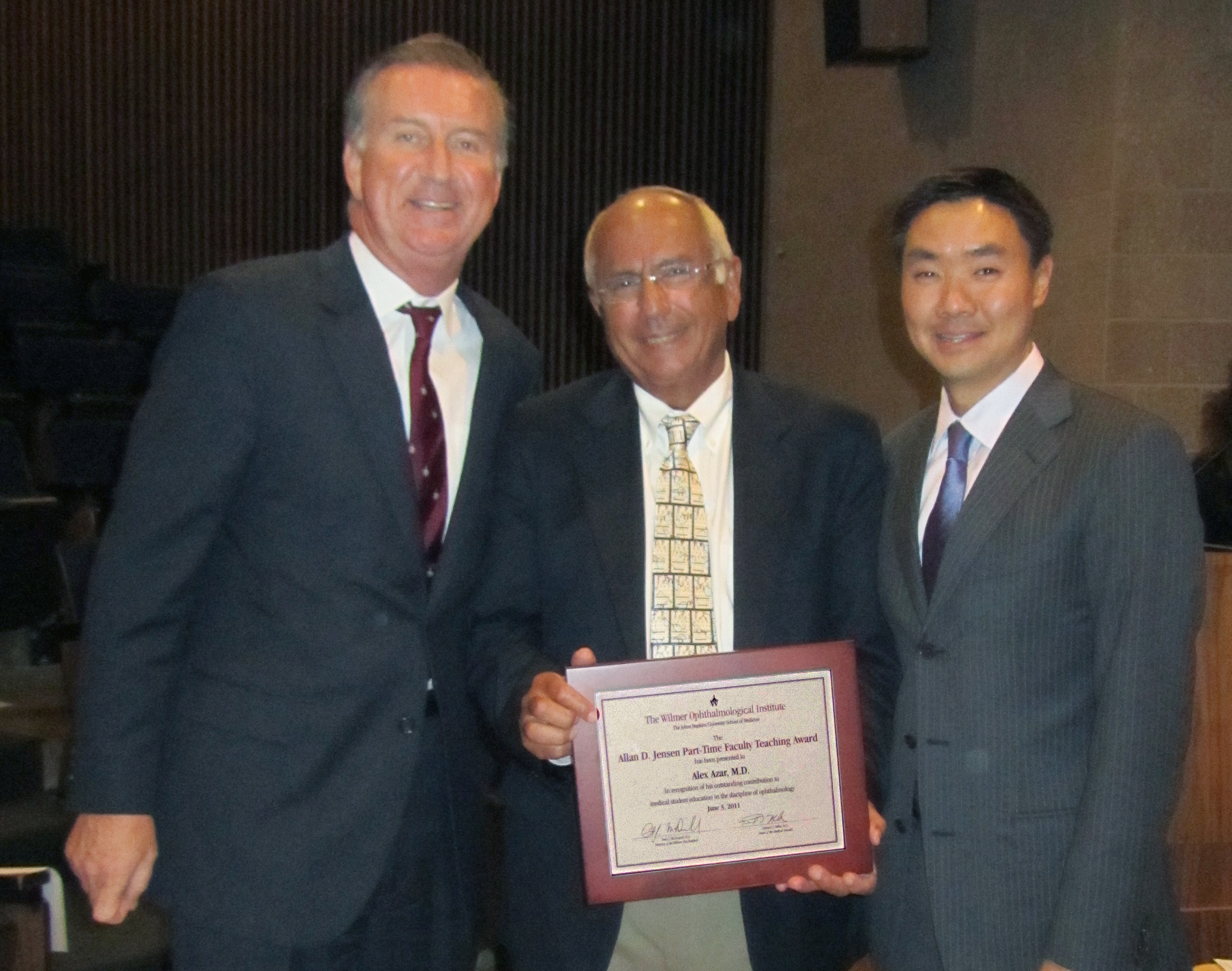 Drs. Peter J. McDonnell, Alex Azar and Albert Jun in 2011.