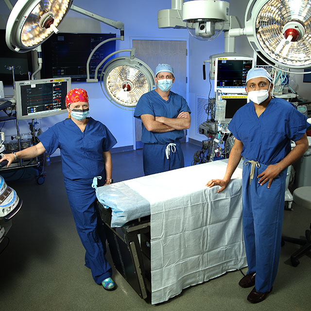 Left to  right:  Pediatric critical care physician Jamie McElrath Schwartz, pediatric cardiac surgeon Bret Mettler and Shelby Kutty, a pediatric cardiologist, jointly direct the Blalock-Taussig-Thomas Pediatric and Congenital Heart Center.
