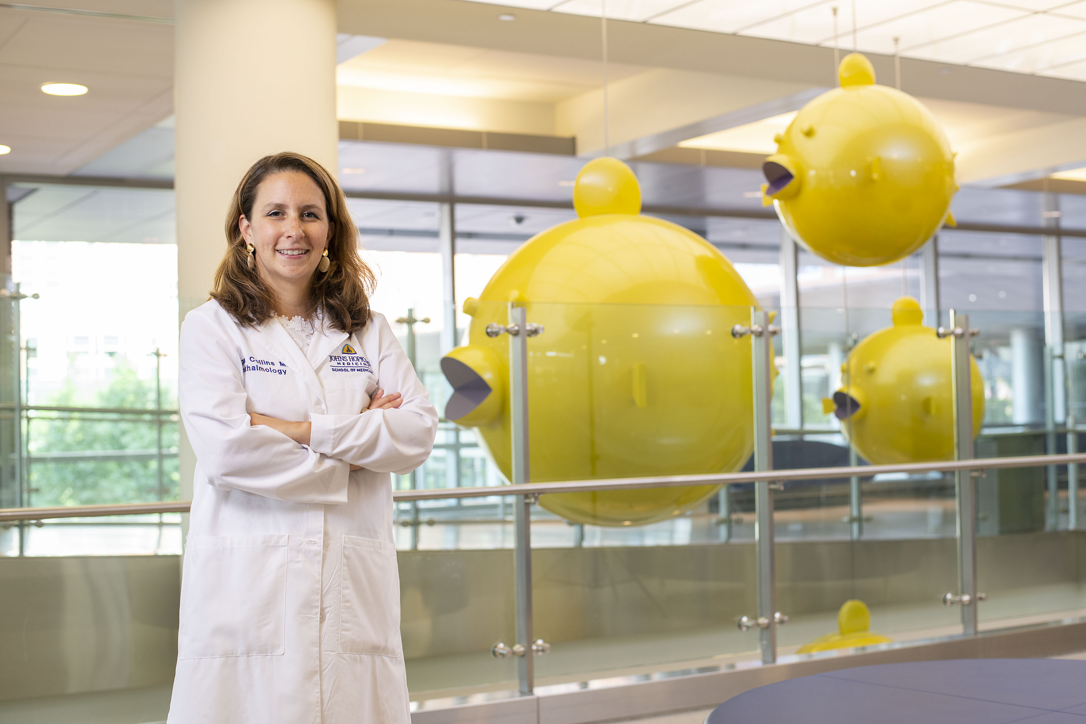 Megan Collins stands inside of the Johns Hopkins Children's Center
