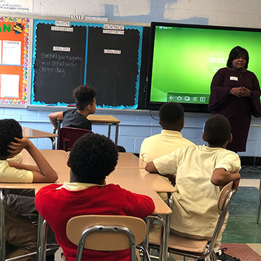 Alicia Wilson speaking to students. 