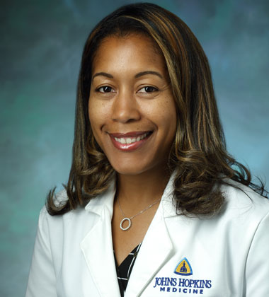 image of Dr. Erica Richards head shot, in a white coat