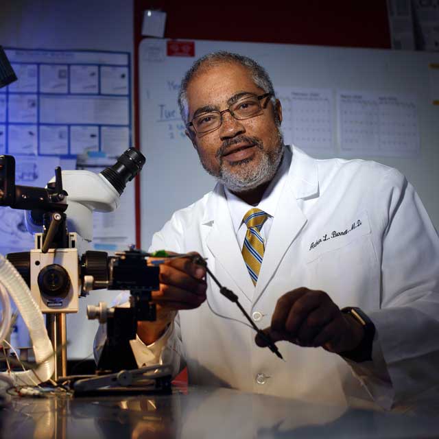 Dr. Arthur Burnett in the lab