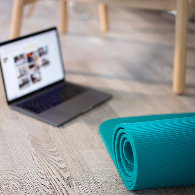 yoga mat, weight, laptop