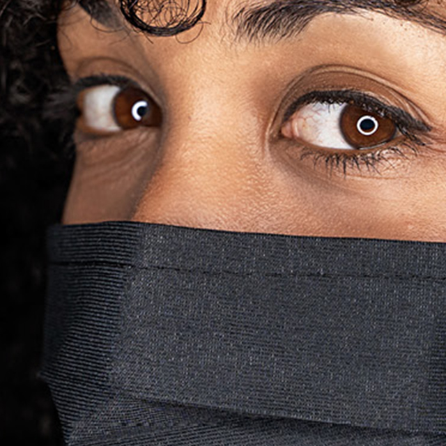 Image from #MaskUp campaign shows an African American woman earing a facemask.