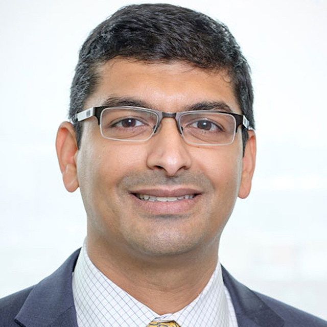 A photo shows Maulik Majmudar.