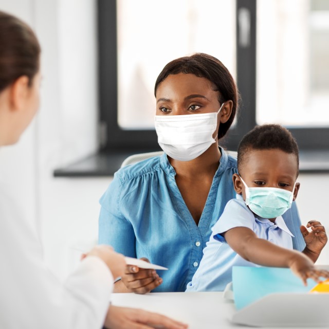 mother and baby with doctor