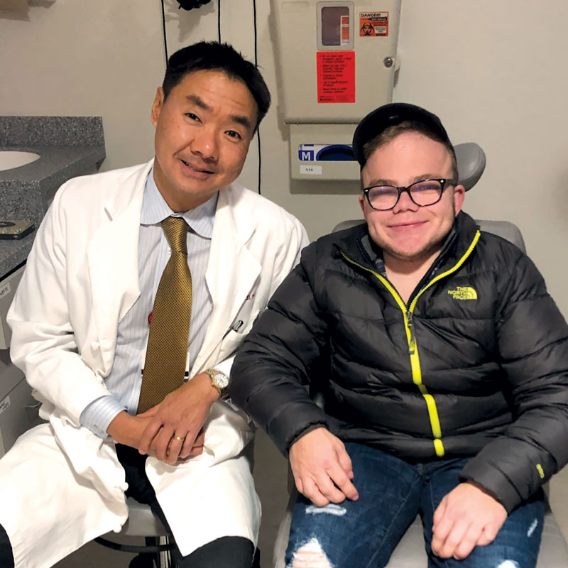 Albert Jun and Henry Harten in an exam room in January 2020. 