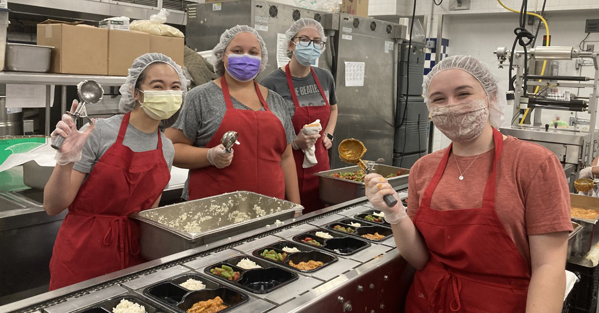 Medical imaging students Sharmaine Moore, Maria Cosentino, Christy Van Aken and Natalie Giovan volunteer at Meals on Wheels of Central Maryland. 