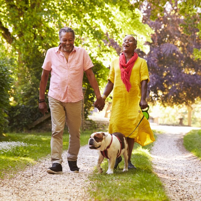 Couple strolling through the park