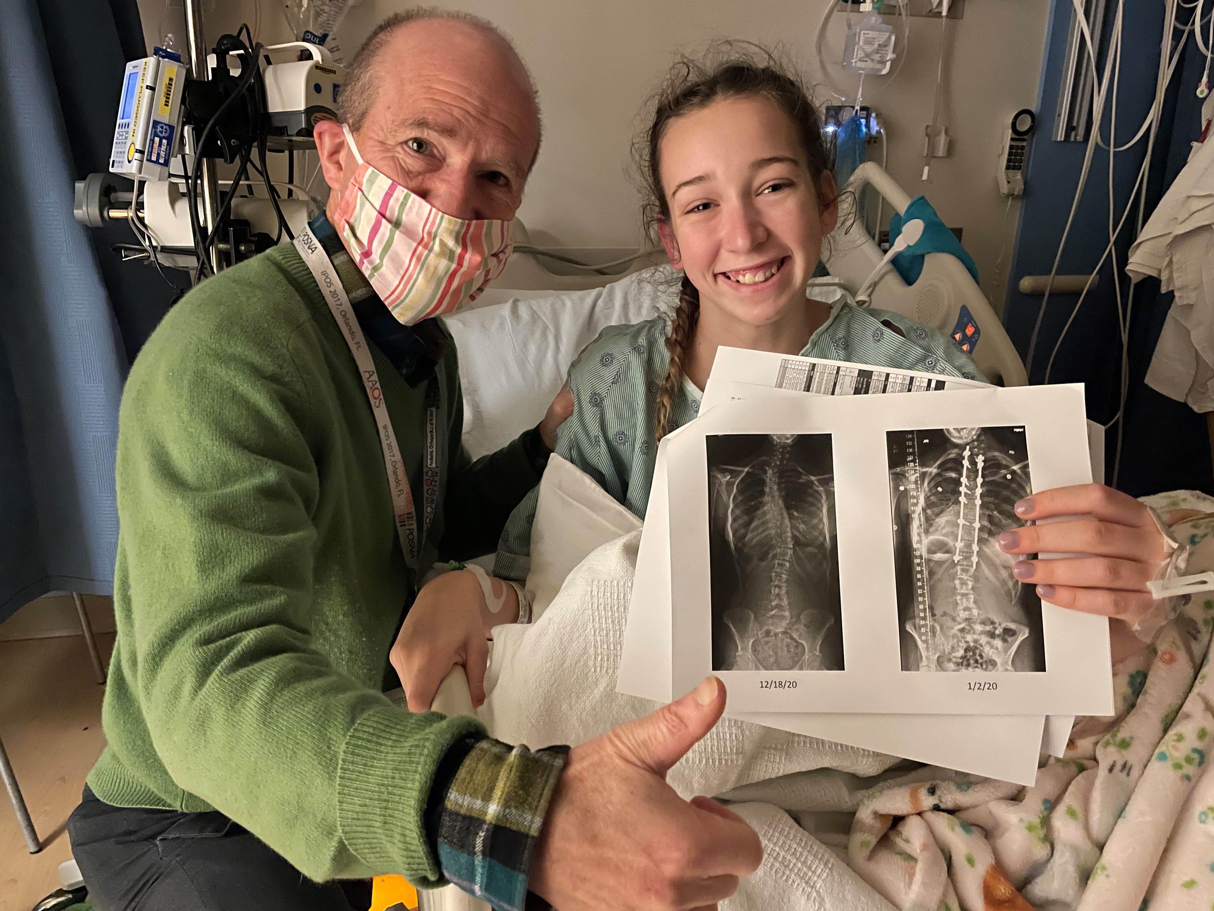 Holly with her doctor after successful surgery. 