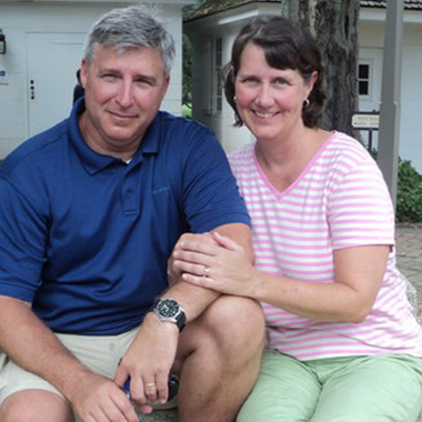 An image shows Greg and Sharon Sopp.