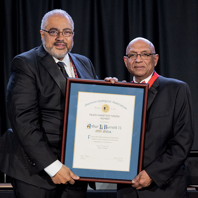 dr burnett receiving award
