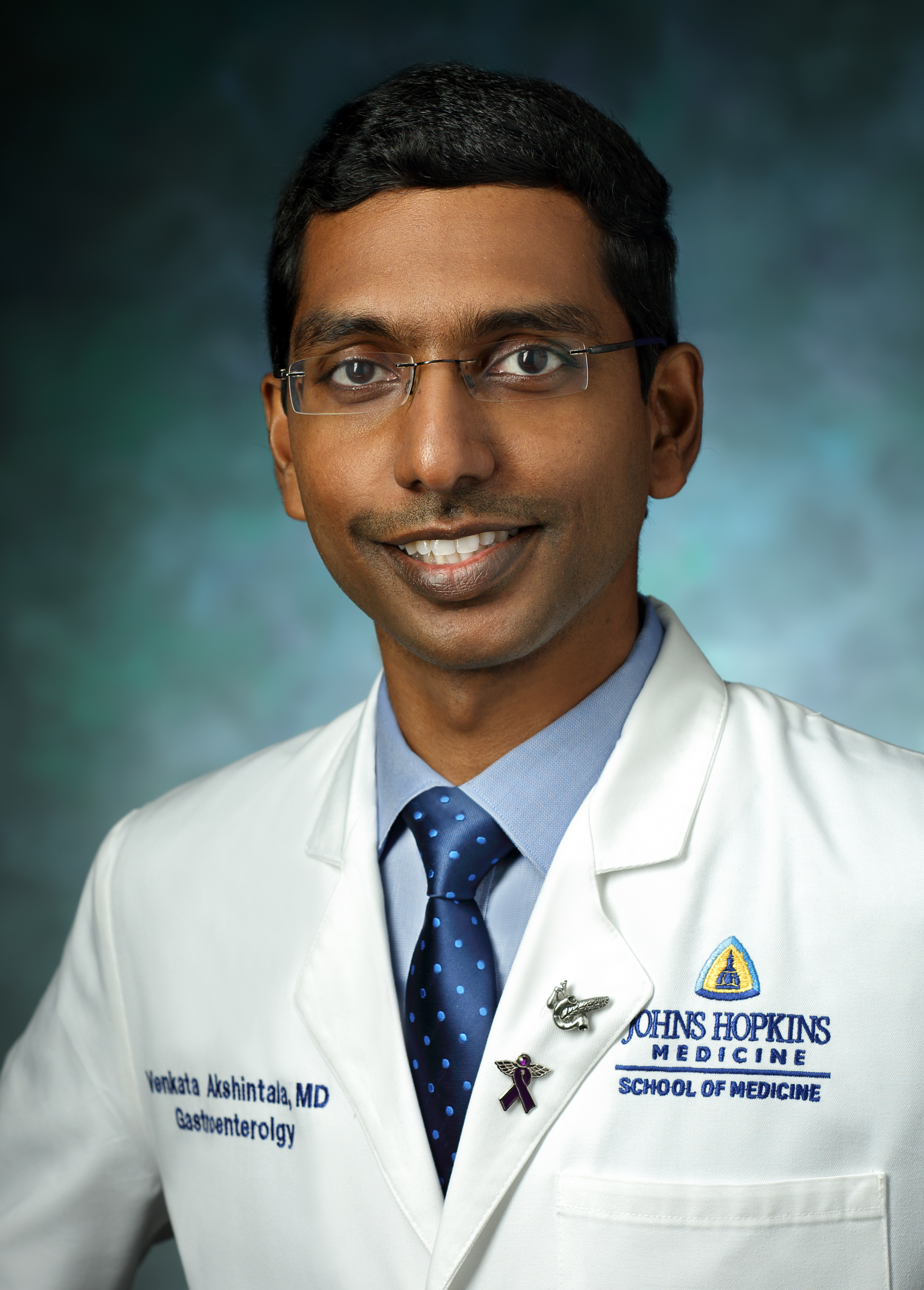 Portrait of Venkata Akshintala in white lab coat