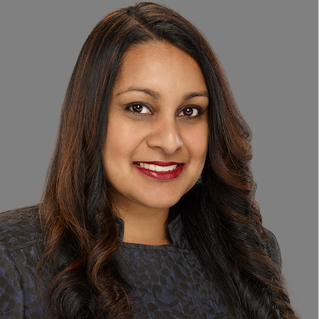 Rita Kalyani on a grey background