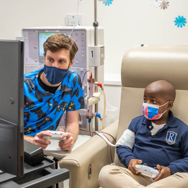 eric clarkson with a patient