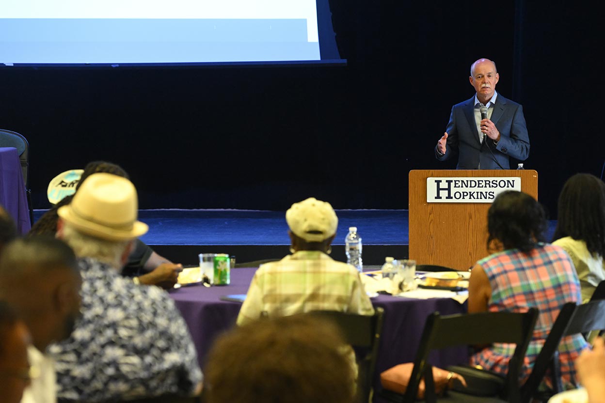 Theodore DeWeese, interim dean of the Johns Hopkins University School of Medicine and CEO of Johns Hopkins Medicine, speaks to community leaders from East Baltimore.