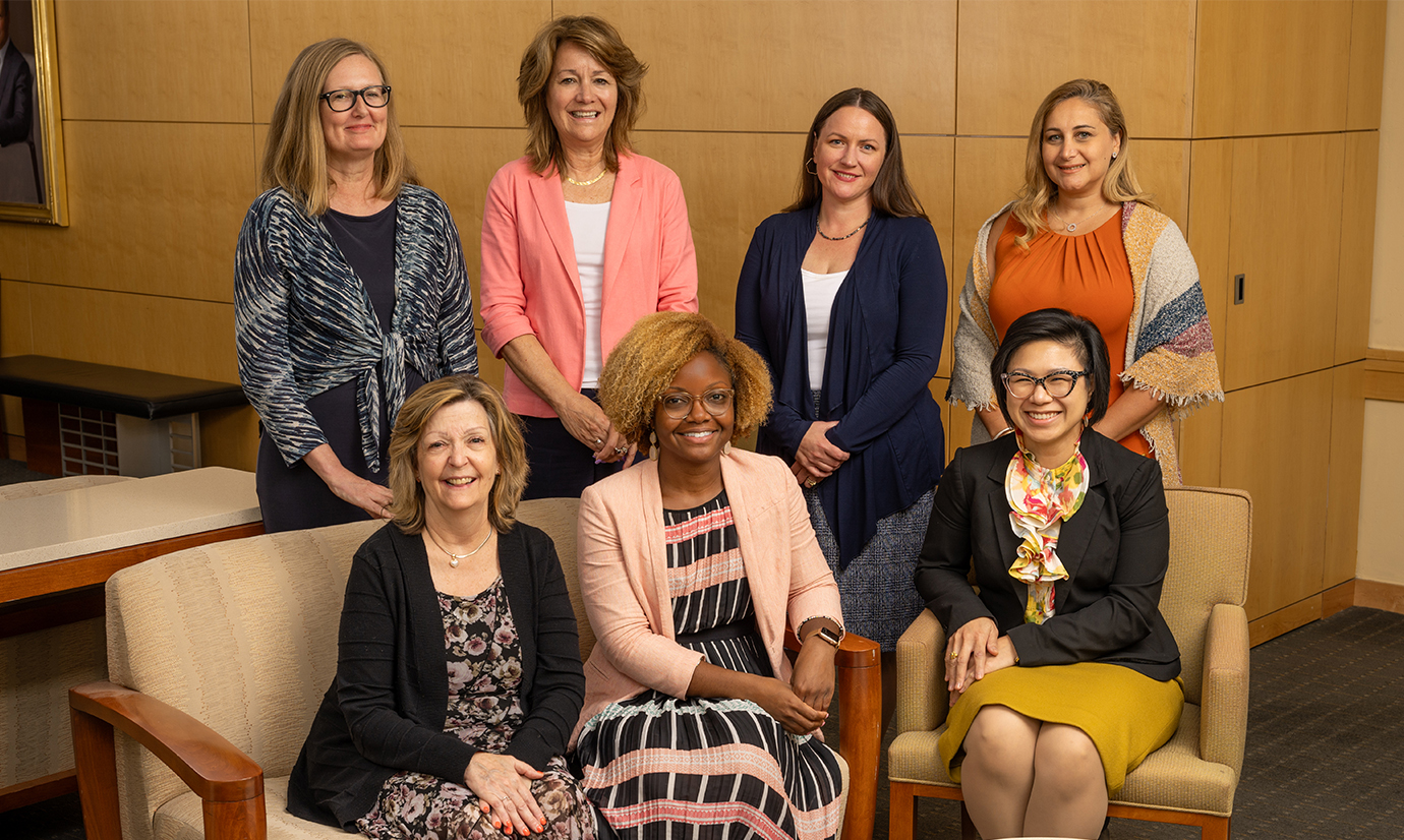 Marissa McKeever manages the team that helps interim Dean and CEO Ted DeWeese prepare for the seemingly endless duties his job requires. Back row, from left: Heather Lowe, Donna Carey, Jessica Hare, Lea Hbeishy. Seated: Kathy Long, Marissa McKeever, Patty Satjapot.