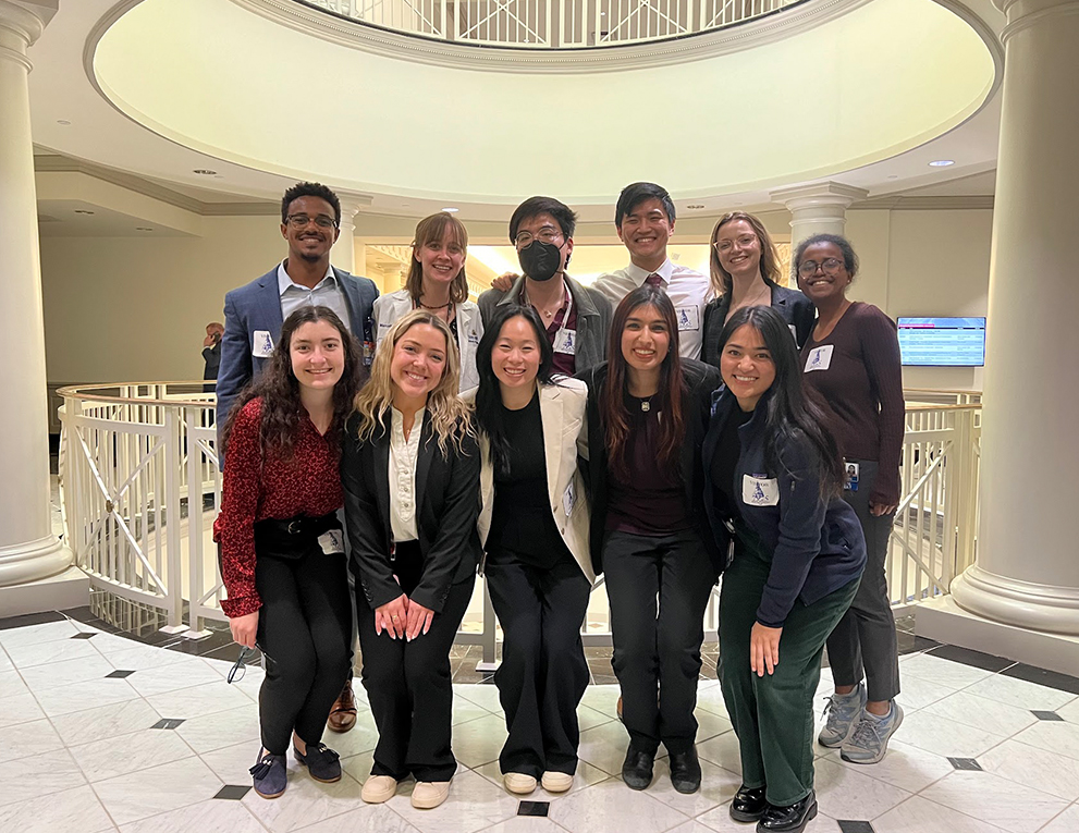 A group of students pose together at the MD state house in Annapolis.